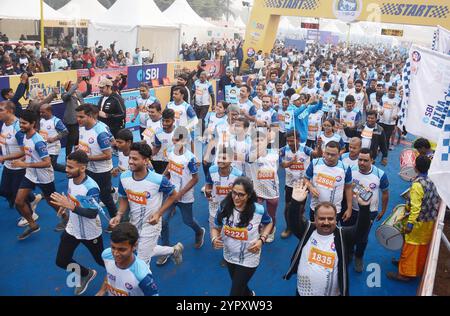 Patna, Indien. Dezember 2024. PATNA, INDIEN - 1. DEZEMBER: Teilnehmer laufen am 1. DEZEMBER 2024 beim Patna Marathon Run für Nasha Mukt Bihar in Gandhi Maidan in Patna, Indien. (Foto: Santosh Kumar/Hindustan Times/SIPA USA) Credit: SIPA USA/Alamy Live News Stockfoto