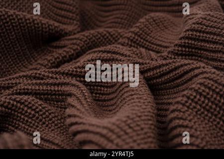 Braune Pullover-Textur als Hintergrund. Draufsicht. Stockfoto