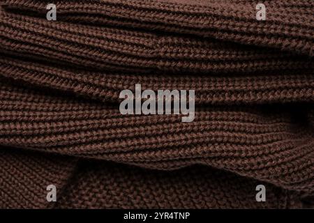 Braune Pullover-Textur als Hintergrund. Draufsicht. Stockfoto