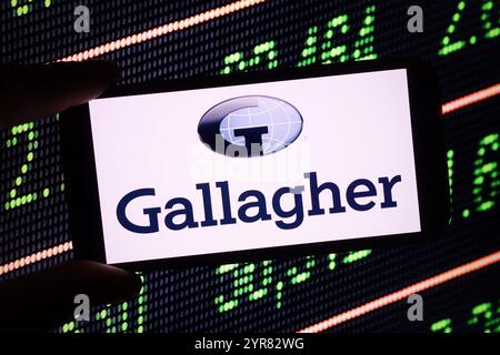 Polen. Dezember 2024. In dieser Fotoabbildung wird das Arthur J Gallagher and Co-Logo auf einem Smartphone-Bildschirm angezeigt. Quelle: SOPA Images Limited/Alamy Live News Stockfoto