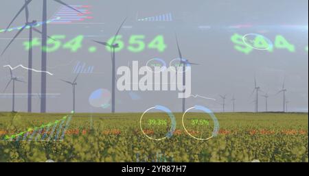 Windturbinen im Feld mit Bild der Finanzdatenverarbeitung über dem Querformat Stockfoto