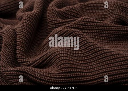 Braune Pullover-Textur als Hintergrund. Draufsicht. Stockfoto