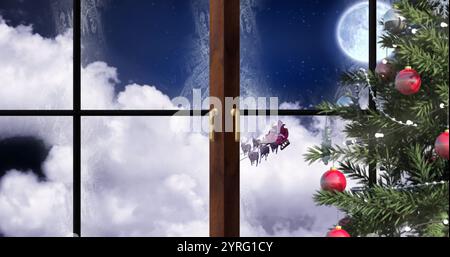 Bild des weihnachtsmanns im Schlitten mit Rentieren Stockfoto