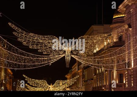 Engel im Weihnachtslicht entlang der Regent Street, London, England Stockfoto