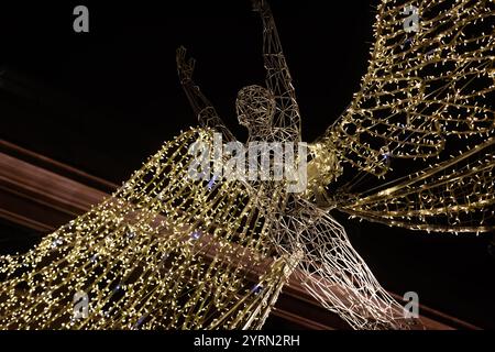 Engel im Weihnachtslicht entlang der Regent Street, London, England Stockfoto