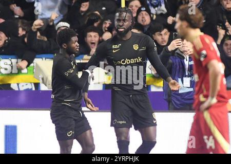 Genk, Belgien. Dezember 2024. Genks Toluwalase Arokodare feiert nach einem Torschuss während eines Fußballspiels zwischen KRC Genk und Standard de Lüttich am Mittwoch, den 4. Dezember 2024 in Genk, im Finale des belgischen Croky Cup 1/8. BELGA FOTO JILL DELSAUX Credit: Belga News Agency/Alamy Live News Stockfoto