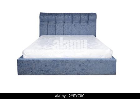 Doppelbett mit weichem Kopfteil. Gepolsterte Möbel. Stockfoto