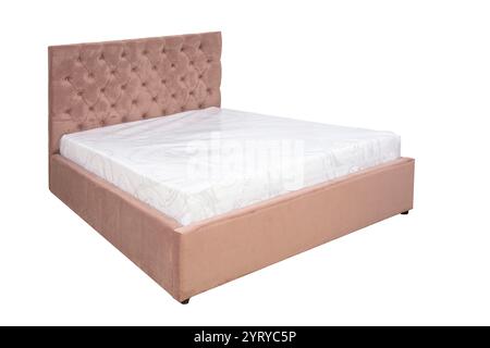 Doppelbett mit weichem Kopfteil. Gepolsterte Möbel. Stockfoto