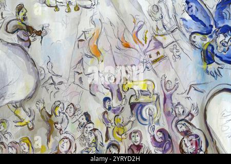 Wandteppich in der Chagall State Hall, in der Knesset (Parlamentsgebäude), in Jerusalem, Israel. Benannt nach dem in Russland geborenen jüdischen Künstler Marc Chagall (1887–1985). Die Halle beherbergt Gobelins (Wandteppiche), die von Chagall an der Ostwand entworfen wurden. Sie wurden am 18. Juni 1969 in Anwesenheit des Staatspräsidenten gehängt. Die Wandteppiche zeigen biblische Motive, Motive aus Chagalls Kindheit in Witebsk in Russland und Motive aus der modernen jüdischen Geschichte. Stockfoto
