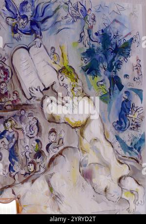 Wandteppich in der Chagall State Hall, in der Knesset (Parlamentsgebäude), in Jerusalem, Israel. Benannt nach dem in Russland geborenen jüdischen Künstler Marc Chagall (1887–1985). Die Halle beherbergt Gobelins (Wandteppiche), die von Chagall an der Ostwand entworfen wurden. Sie wurden am 18. Juni 1969 in Anwesenheit des Staatspräsidenten gehängt. Die Wandteppiche zeigen biblische Motive, Motive aus Chagalls Kindheit in Witebsk in Russland und Motive aus der modernen jüdischen Geschichte. Stockfoto