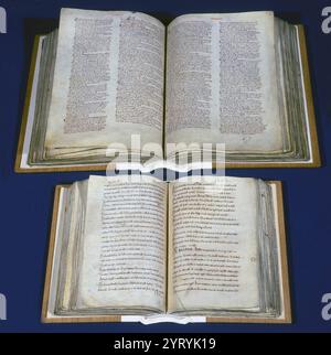 Das Domesday Book ist die älteste Regierungsurkunde im Nationalarchiv. Foto des Little Domesday und des Great Domesday, die viele Informationen über England im 11. Jahrhundert enthalten. 1086 wollte König Wilhelm I. den Wert seines neuen Königreichs herausfinden: Wer besaß, welches Eigentum, wo sie lebten, wie viel das Land Wert war und welche Steuern er erheben konnte. Er schickte seine eigenen Regierungskommissare durch das Land, um Fragen vor lokalen Gerichten zu stellen und Informationen zu sammeln. Diese Bücher zeigen, wie sich der Landbesitz mit der normannischen Eroberung veränderte und wie Stockfoto