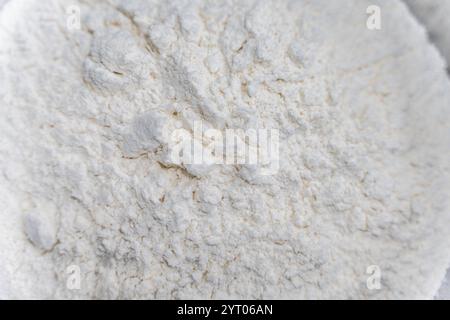 Hintergrund mit der Textur von Weizenmehl. Nahaufnahme. Kopierraum. Hochwertige Fotos Stockfoto