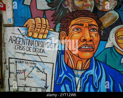 Graffiti, die gegen die Auswirkungen der dritten argentinischen Schuldenkrise protestieren, mit einem Mann, der ein Diagramm der realen Gehaltswerte hält - Buenos Aires Argentinien Stockfoto