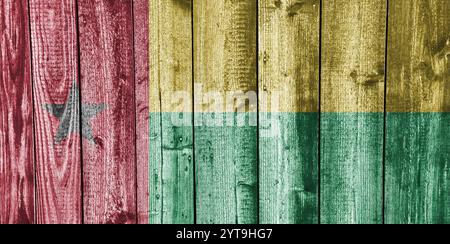 Flagge von Guinea-Bissau auf verwittertem Holz Stockfoto