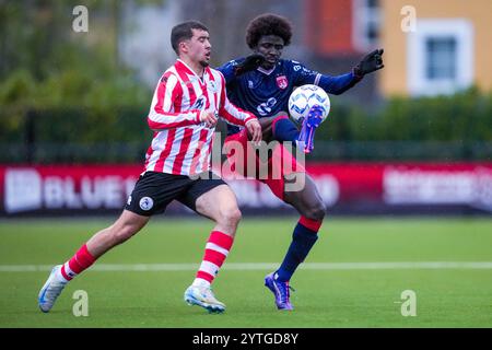 Rotterdam, Niederlande. Dezember 2024. ROTTERDAM, 12.07.2024, Sportkomplex Nieuw Terbregge, Saison 2024/2025, Fußball, Tweede Divisie . Spiel zwischen Jong Sparta - Noordwijk . Noordwijk Spieler Agostinho Antonio Masal Manessim und Jong Sparta Spieler Aymane Bais Credit: Pro Shots/Alamy Live News Stockfoto