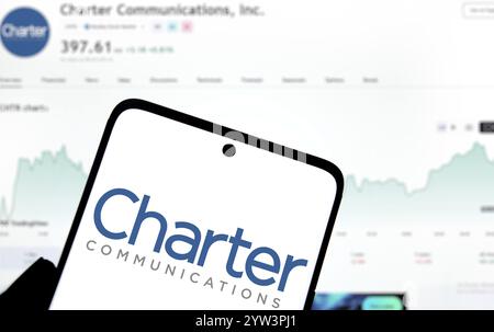 Dhaka, Bangladesch - 5. Dezember 2024: Das Logo für die Kommunikation von Charter wird auf dem Smartphone angezeigt. Charter Communications Inc. Ist ein US-amerikanisches Telekommunikationsunternehmen Stockfoto