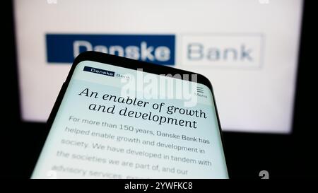 Deutschland. Juli 2024. In dieser Abbildung ist ein Smartphone mit der Website des dänischen Finanzdienstleistungsunternehmens Danske Bank WIE vor dem Geschäftslogo zu sehen. Quelle: SOPA Images Limited/Alamy Live News Stockfoto