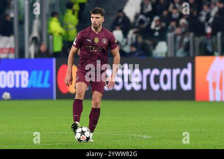 Turin, Italien. Dezember 2024. Ruben Dias von Manchester City während des UEFA Champions League Spiels zwischen Juventus FC und Manchester City im Allianz Stadium in Turin, Italien, am 11. Dezember 2024 Foto Giuliano Marchisciano während Juventus FC gegen Manchester City, UEFA Champions League Fußballspiel in Turin, Italien, 11. Dezember 2024 Credit: Independent Photo Agency/Alamy Live News Stockfoto
