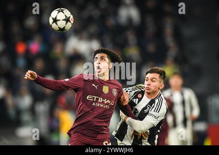 Rico LEWIS aus Manchester City und Francisco CONCEICAO aus Juventus während des Fußballspiels der UEFA Champions League, League Phase MD6 zwischen Juventus FC und Manchester City FC am 11. Dezember 2024 im Allianz Stadium in Turin, Italien Stockfoto