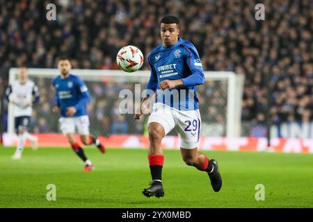 Glasgow, Großbritannien. Dezember 2024. Die Rangers spielten Tottenham Hotspur (Spurs) in der UEFA Europa League - League Stage im Ibrox Stadium in Glasgow, Schottland. Das Ergebnis war die Rangers 1:1, Tottenham Hotspur. Die Tore wurden von H. Igamane (47) für die Rangers und D. Kulusevski (75) für die Spurs erzielt. Quelle: Findlay/Alamy Live News Stockfoto