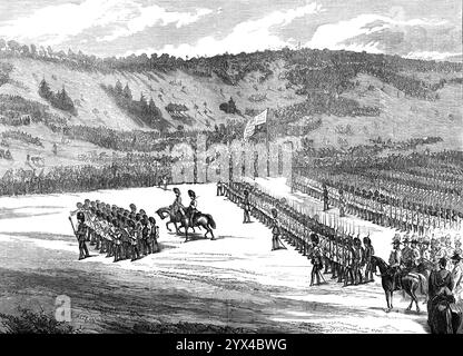 The Autumn Campaign: The March Past at Beacon Hill, Amesbury, 1872. Scheinschlachten der britischen Armee in Wiltshire. "...Tausende von Menschen versammelten sich, um das große Spektakel zu genießen... der Marsch der gesamten vereinigten Armee vorbei an dem Oberbefehlshaber, Feldmarschall dem Herzog oder Cambridge [und] den anderen Prinzen... bildeten eine große Kavalkade und in einer Vielzahl von prächtigen Uniformen gekleidet, ritten sie entlang der gesamten Linie der Truppen, inspizierten die Reihen... die Truppen [nummerierten] insgesamt 30.000 Mann... der Marsch an ihren Königlichen Hoheiten wurde in wunderschöner Ordnung durchgeführt... die Befehlshaber... die Befehlshaber Stockfoto