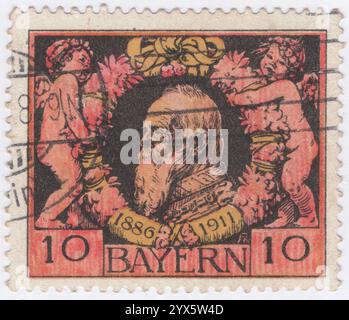 BAYERN — 10. Juni 1911: 10 Pfennig-Rose, gelb-schwarze Briefmarke mit Porträt des Prinzen Regenten Luitpold beim Silbernen Jubiläum. Luitpold Karl Joseph Wilhelm Ludwig, Prinzregent von Bayern (12. März 1821 – 12. Dezember 1912), war von 1886 bis 1912 de facto Herrscher über Bayern, als Regent für seine Neffen Ludwig II. Und König Otto. Seine Regentschaft entstand aufgrund der geistigen Unfähigkeit seiner Neffen Stockfoto