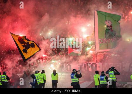 Die Green Brigade, auch bekannt als Celtic Ultras, Unterstützer des Celtic Football Club, die in der schottischen Premier Football Division spielen, Stockfoto