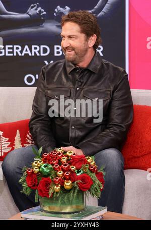 Doral, USA. Dezember 2024. DORAL, FLORIDA – 16. DEZEMBER: Gerard Butler wird während von Univisions Despierta America gesehen, um seinen neuen Film den of Thieves 2: Pantera in den Univision Studios am 16. Dezember 2024 in Doral, Florida zu promoten. (Foto: Dax Tamargo/SIPA USA) Credit: SIPA USA/Alamy Live News Stockfoto
