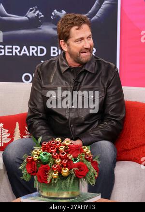 Doral, USA. Dezember 2024. DORAL, FLORIDA – 16. DEZEMBER: Gerard Butler wird während von Univisions Despierta America gesehen, um seinen neuen Film den of Thieves 2: Pantera in den Univision Studios am 16. Dezember 2024 in Doral, Florida zu promoten. (Foto: Dax Tamargo/SIPA USA) Credit: SIPA USA/Alamy Live News Stockfoto