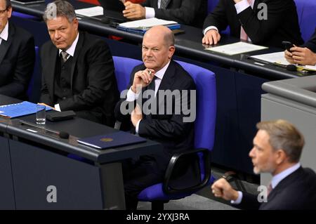 Robert Habeck, Olaf Scholz und Christian Lindner in der 205. Sitzung des Deutschen Bundestages im Reichstagsgebäude. Berlin, 16.12.2024 *** Robert Habeck, Olaf Scholz und Christian Lindner auf der 205. Tagung des Deutschen Bundestages im Reichstagsgebäude Berlin, 16 12 2024 Foto:XF.xKernx/xFuturexImagex bundestagssitzung205 4179 Stockfoto