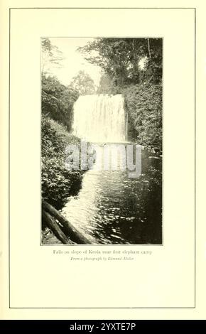 African Game Trails, 1910, Jagd, Uganda, Beschreibung und Reise, Afrika Ost, Ein heiterer Wasserfall fällt einen felsigen Hang hinunter, umgeben von üppigem Grün, das beide Seiten des fließenden Wassers flankiert. Der Pool am Fuße des Wasserfalls reflektiert das Laub darüber und schafft eine ruhige Atmosphäre. In der Ferne weckt der Anblick einer wunderschön eingerahmten Landschaft ein Gefühl von Ruhe und natürlicher Schönheit und lädt die Zuschauer ein, die ruhige Pracht dieser unberührten Umgebung zu schätzen. Ein Bilduntertitel am unteren Rand gibt einen Kontext an, der den Ort als „Falls on Hang of Kenia in der Nähe von First Ele“ angibt Stockfoto