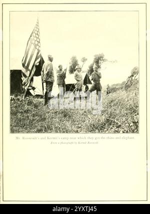 Afrikanische Wildwege, 1910, Jagd, Uganda, Beschreibung und Reise, Afrika Ost, in einer historischen Expedition versammelt sich eine Gruppe von Männern um einen Campingplatz, wo Zelte vor dem Hintergrund einer großen Flagge aufgestellt werden. Unter ihnen sind Persönlichkeiten, die verschiedene Aktivitäten ausüben, wahrscheinlich Jagd machen oder sich auf eine Erkundung vorbereiten. Die Szene fängt einen Moment der Kameradschaft und des Abenteuers ein und unterstreicht die Verbindung zwischen den Individuen und der Wildnis um sie herum. Die Betonung ihrer Kleidung und Werkzeuge deutet darauf hin, dass der Schwerpunkt auf der Erforschung des frühen 20. Jahrhunderts liegt, die möglicherweise mit der Erhaltung oder dem BI-Schutz zusammenhängt Stockfoto