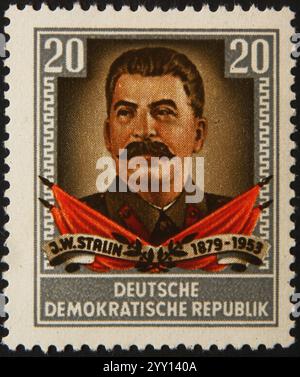 Joseph Stalin 1879–1953, ein sowjetischer Revolutionär und Politiker. Porträt auf einer ostdeutschen Marke Stockfoto