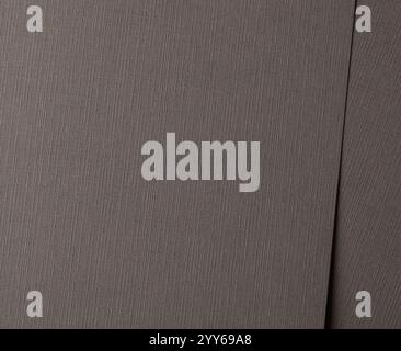Braune Papierstruktur mit leinenähnlichem Schraffurmuster in neutralen Taupe- und Steingrauen Tönen. Matte und gedämpfte Oberfläche, Kombination aus organischem und sophist Stockfoto