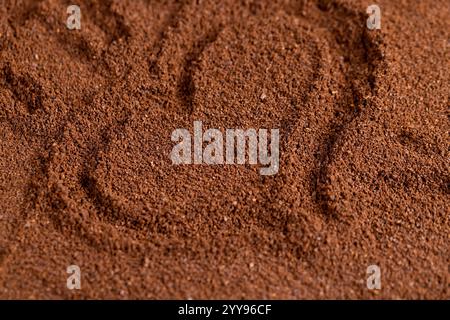 Kaffee aus Kaffeebohnen, gemahlenes Kaffeepulver aus der Nähe Stockfoto