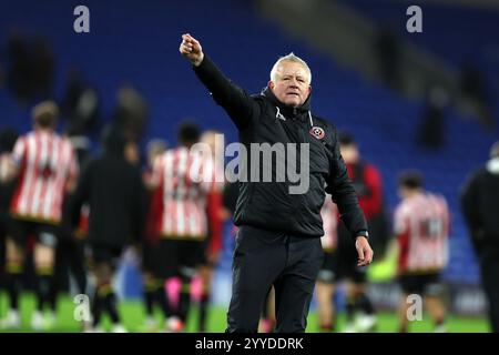 Cardiff, Großbritannien. Dezember 2024. Chris Wilder, der Manager von Sheffield United feiert nach dem Spiel. EFL Skybet Championship Match, Cardiff City gegen Sheffield Utd im Cardiff City Stadium in Cardiff, Wales am Samstag, den 21. Dezember 2024. Dieses Bild darf nur für redaktionelle Zwecke verwendet werden. Nur redaktionelle Verwendung, Bild von Andrew Orchard/Andrew Orchard Sportfotografie/Alamy Live News Credit: Andrew Orchard Sportfotografie/Alamy Live News Stockfoto