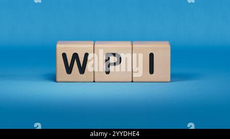 Holzwürfel mit dem Wort WPI.Nahaufnahme von Holzelementen,Business Concept.3D-Rendering auf blauem Hintergrund. Stockfoto