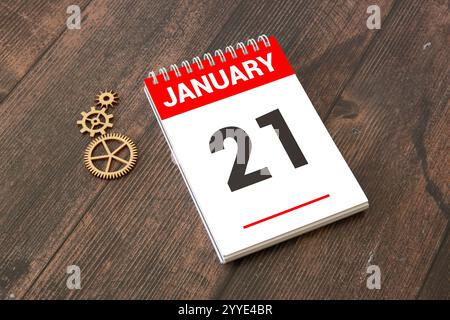 Eine Nahaufnahme eines hölzernen ewigen Kalenders mit dem 21. Januar. Stockfoto