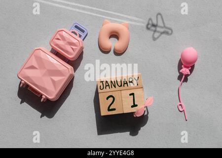 Eine Nahaufnahme eines hölzernen ewigen Kalenders mit dem 21. Januar. Stockfoto