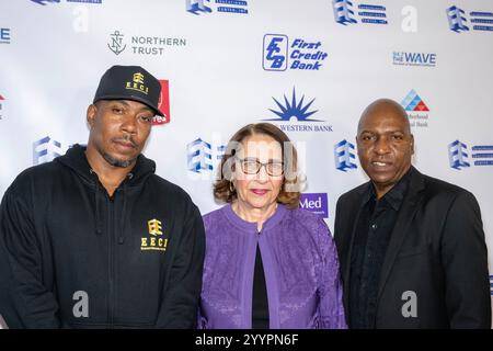 Los Angeles, Usa. Dezember 2024. (L-R) EECI VP Marketing Cheo Leslie, EECI Executive Director Barbara Stanton und EECI VP of Operations Del Atkins nehmen am Entrepreneur Educational Center Inc. Teil Grand Celebration and Open House im EECI Office, Los Angeles, CA, 21. Dezember 2024 Credit: SOPA Images Limited/Alamy Live News Stockfoto