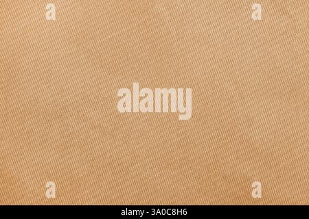 Beigefarbenes Sofa Couch Stoff Muster Textur als Hintergrund, Draufsicht Stockfoto