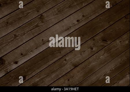 Diagonale dunkle alte Holzbretter als Hintergrund Stockfoto