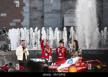 Italien. März 2025. Formel-1-Fahrerteam Ferrari Charles Leclerc und Lewis Hamilton begrüßen die Fans am 6. März 2025 auf dem Burgplatz in Mailand, Italien (Foto: © Tiziano Ballabio/Pacific Press via ZUMA Press Wire) NUR REDAKTIONELLE VERWENDUNG! Nicht für kommerzielle ZWECKE! Stockfoto