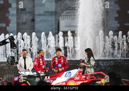 Italien. März 2025. Formel-1-Fahrerteam Ferrari Charles Leclerc und Lewis Hamilton begrüßen die Fans am 6. März 2025 auf dem Burgplatz in Mailand, Italien (Foto: © Tiziano Ballabio/Pacific Press via ZUMA Press Wire) NUR REDAKTIONELLE VERWENDUNG! Nicht für kommerzielle ZWECKE! Stockfoto