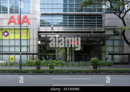 Makati City, Manila, Philippinen - 1. Februar 2025: Der Eingang zum AIA-Turm in Makati City, Philippinen. Stockfoto