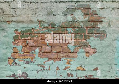 Verputzte gemalte Ziegelwand abstrakter Hintergrund Stockfoto