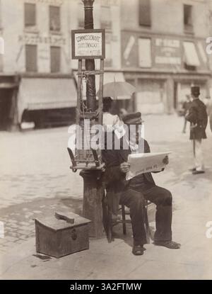 Dieses Foto von Eugène Atget aus dem Jahr 1899-1900 zeigt einen Kommissionär, einen französischen Portier oder Portier und zeigt die Figur in einem historischen Kontext. Stockfoto