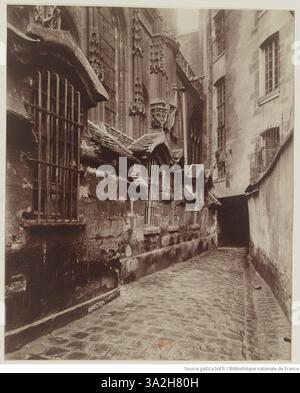 Dieses Foto von Eugène Atget zeigt die Kirche St. Gervais et Protais, die ihre architektonischen Besonderheiten und das historische Ambiente des Paris des frühen 20. Jahrhunderts einfängt. Stockfoto