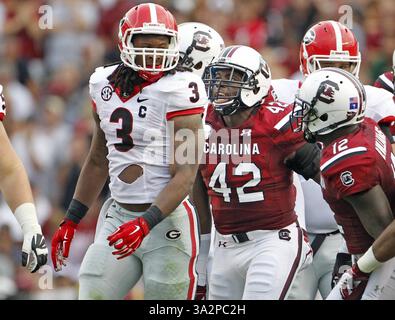 13. September 2014 - Columbia, SC, USA - South Carolina Gamecocks Linebacker Jordan Diggs (42) hat einige Worte für Georgia Bulldogs Running Back Todd Gurley (3) nach einem Stopp in der ersten Hälfte des Gamecocks-Spiels gegen Georgia im Williams-Brice Stadium, Samstag, 13. September 2014 Columbia, S.C. (Kreditbild: © Gerry Melendez/MCT/ZUMA Wire) Stockfoto