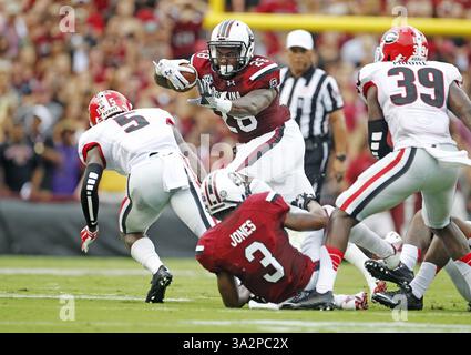13. September 2014 - Columbia, SC, USA - South Carolina Gamecocks Running Back Mike Davis (28) versucht während der ersten Hälfte des Gamecocks-Spiels gegen Georgia im Williams-Brice Stadium, Samstag, 13. September 2014 in Columbia, S.C. (Kreditbild: © Gerry Melendez/MCT/ZUMA Wire) Stockfoto